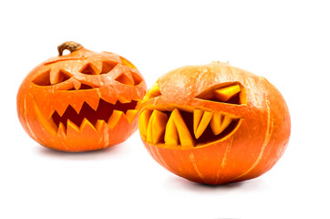 two spooky pumpkins on white background