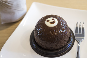chocolate cake topped with ganache