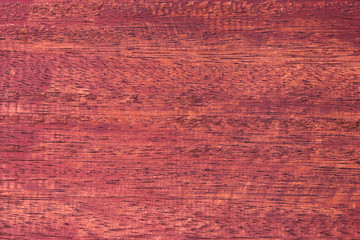 Surface of red wood table. Traces of handmade. Use for background or banner website and template. Beautiful pattern