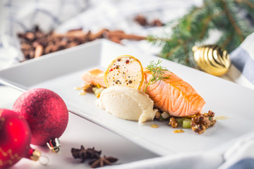 Christmas food with salmon fillet and decoration home hotel or restaurant