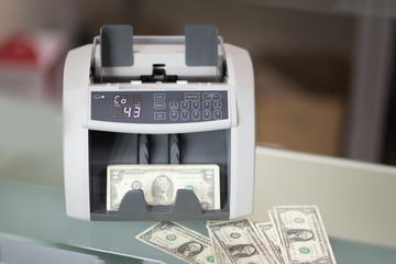 Banknote counter and dollars banknotes
