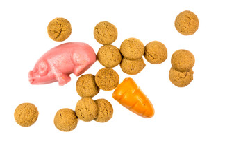 Group of Pepernoten cookies with marzipan pig and carrot