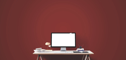 Computer display and office tools on desk. Desktop computer screen isolated. Modern creative workspace. Front view.