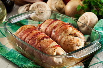 Baked chicken breast stuffed with champignon