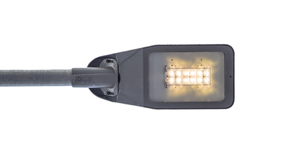 Modern LED street light on white background