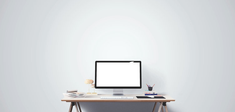 Computer display and office tools on desk. Desktop computer screen isolated. Modern creative workspace. Front view.