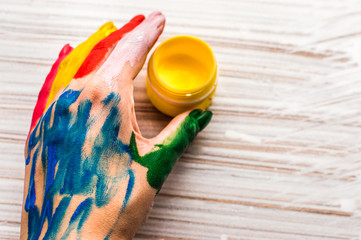 hand of the person in paint for drawing