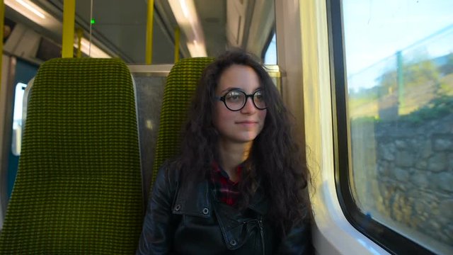 young woman in train