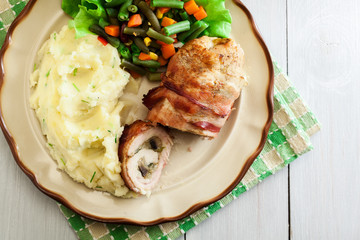 Chicken breast stuffed with champignon