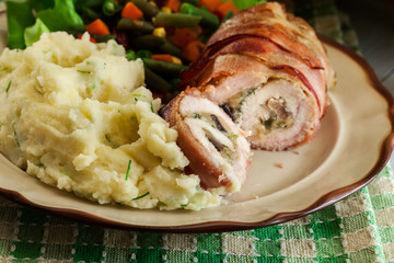 Chicken breast stuffed with champignon
