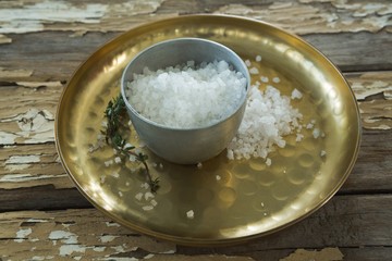 Bowl of salt in a plate