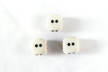 Three dices have triple two point isolated on white background.