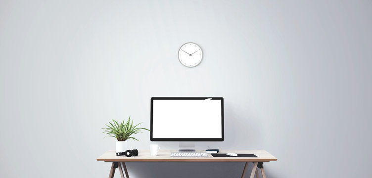 Computer display and office tools on desk. Desktop computer screen isolated. Front view.