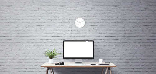 Computer display and office tools on desk. Desktop computer screen isolated. Modern creative workspace. Front view.