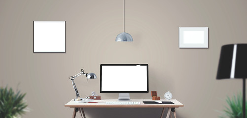 Computer display and office tools on desk. Desktop computer screen isolated. Modern creative workspace background. Front view.