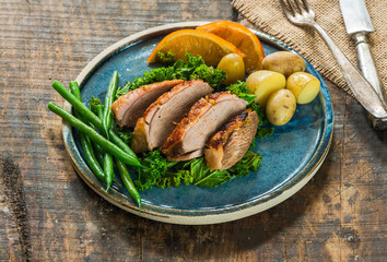 Roast duck fillets with orange marmalade and chilli glaze
