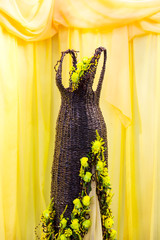 Rattan dress decorated with flowers, nobody