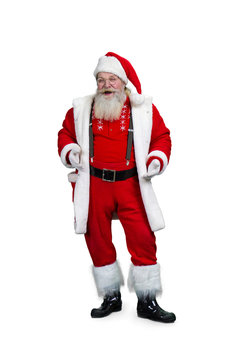 Authentic Santa Claus, studio shot. Happy Santa Claus in eyeglasses isolated on white background. Cheerful bearded Santa Claus.