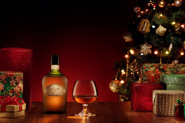 close up view  of bottle and glass with rum on color back. self made label.