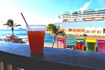 Fototapeta na wymiar Mixed drink/cocktail on dock in Nassau, Bahamas