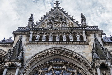 Architectural fragments of Reims Notre-Dame cathedral: North side. Notre-Dame de Reims Cathedral (Our Lady of Reims, 1275) is Roman Catholic Church in Reims. Champagne-ardenne, France.