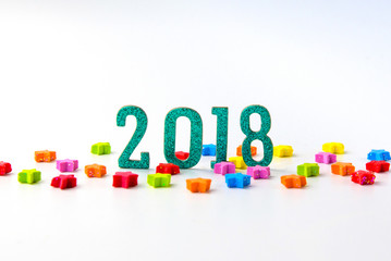 2018 New year concept. group of colorful stars around 2 0 1 8 number on white background