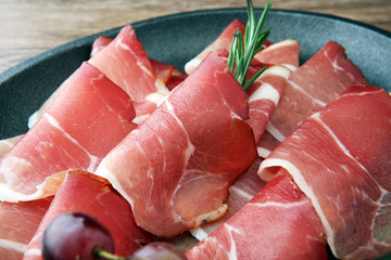 prosciutto with rosemary  or ham of black forest or serrano.