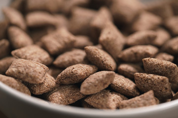 chcolate cereal pillow in white bowl on table