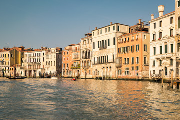 Historic buildings on the banks of the grand canal in Venice.