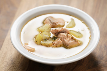 closeup fish soup with trout in bowl