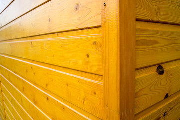Yellow wooden siding