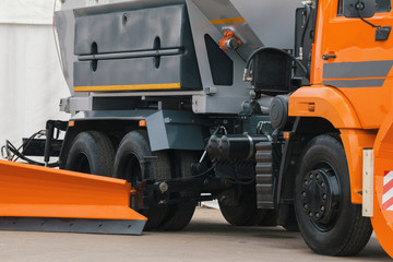 Orange scraper - part of truck constriction vehicle