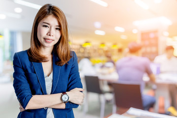 beautiful asian business woman  blur image background of library