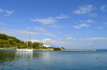 Antipaxos harbour white yacht