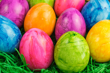 Fototapeta na wymiar colorful painted easter eggs in a nest