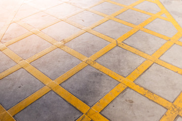 yellow cross line on street signage floor symbol