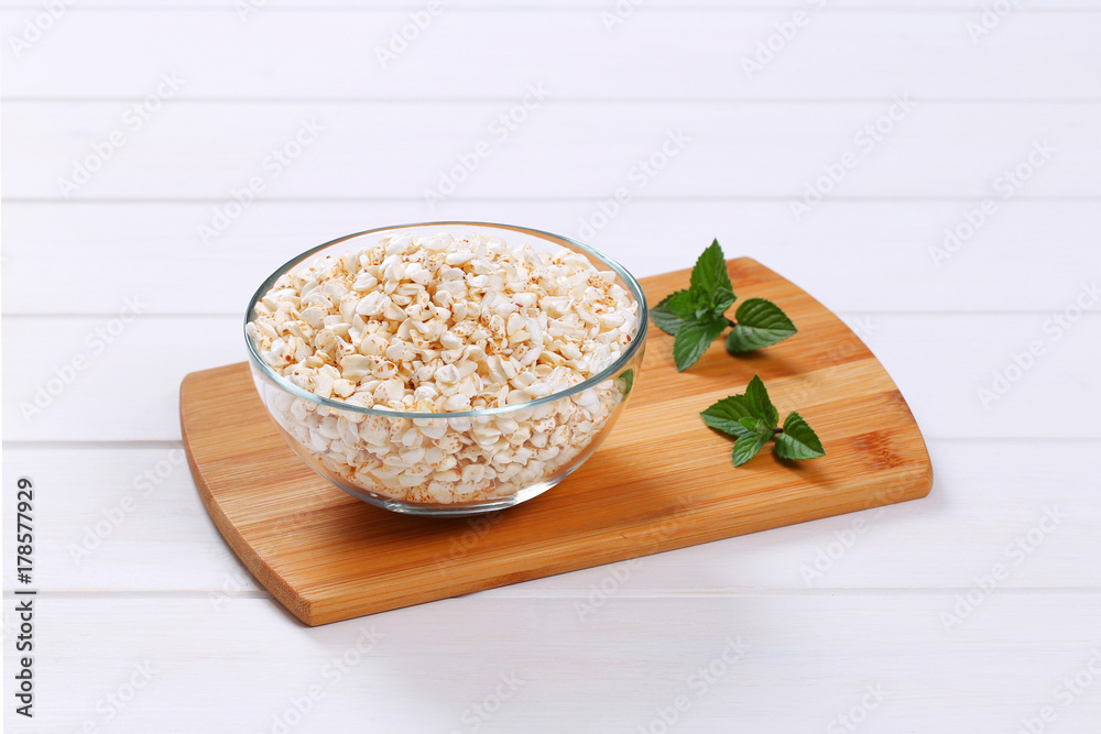 Wall mural bowl of puffed buckwheat