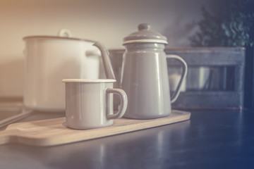 asian tradition white ceramic set on wooden shelf background with nature light
