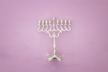 jewish holiday Hanukkah image background with traditional menorah (traditional candelabra)