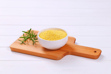 bowl of raw millet grains