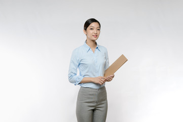 Asian Businesswoman hold with folder