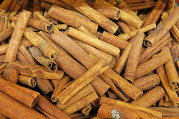 Many cinnamon sticks. Background of cinnamon sticks.