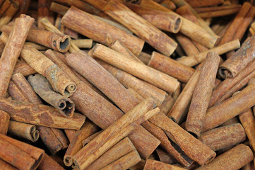 Many cinnamon sticks. Background of cinnamon sticks.