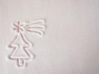 Cute Christmas tree lineart drawn in a layer of sugar.