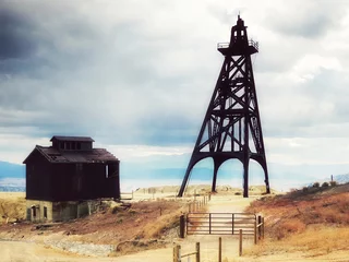 Foto op Canvas Old mining headframes in a huge copper mine, Butte, Montana, United States © Silvy K.