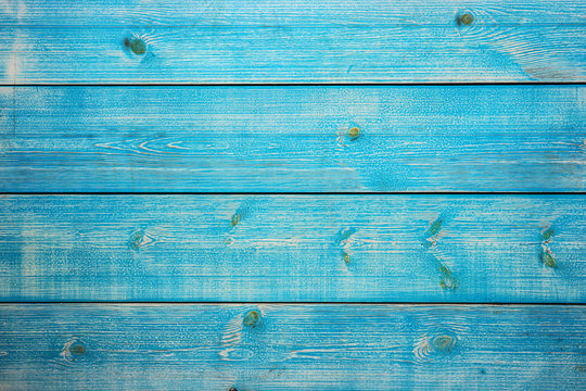 Old painted blue colored wooden background for your design