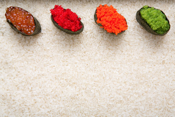 Top view on sushi gunkan on white rice background and texture copy space