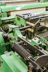 Part of the obsolete green loom at the weaving factory
