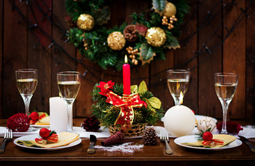 Traditional dishware on Christmas table.