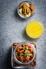 Healthy vegan peanut butter honey cinnamon granola. Top view, space for text.